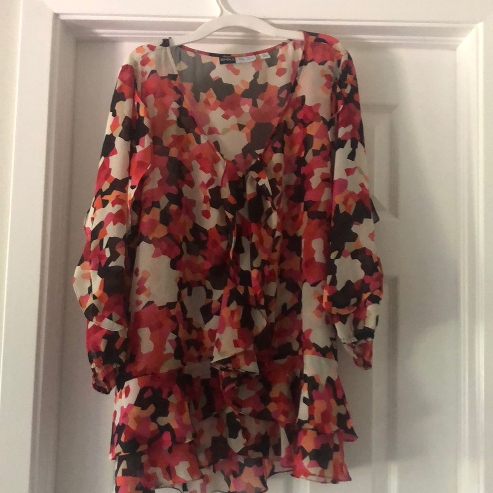 See thru plus size top. Multi colored.